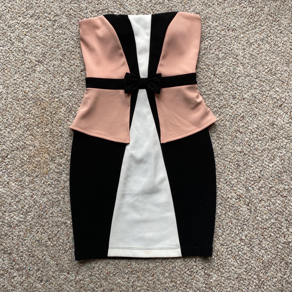 Tuxedo dress with pink peplum detail